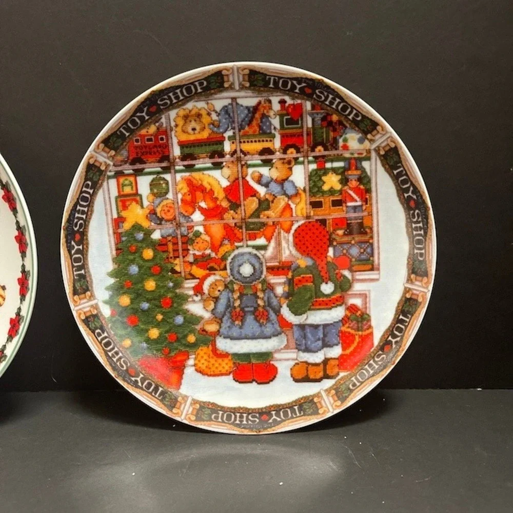 Lillian Vernon Christmas Plates Set 2 Santa Toy Shop Cross Stitch Style 7.5 in